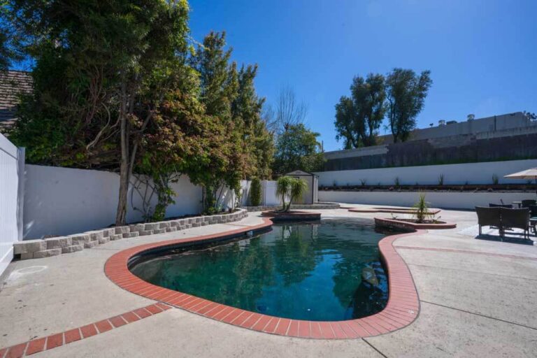 Backyard pool at a Harmony Junction Recovery home in Lake Forest